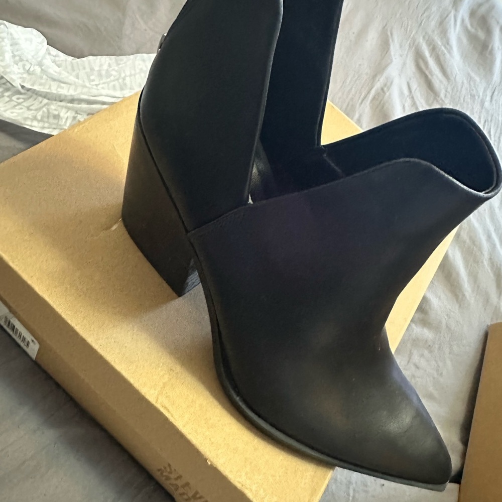 Steve Madden Black Ankle Booties with Sleek Design